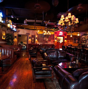 Photo of the saloon-like experience inside of a Cool Hand Luke's location